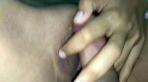 Pretty shaved girl fucks wet pussy to orgasm