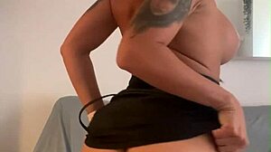 can you believe this tattooed brunette's dildo play in tight pussy?