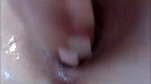 Busty teen feels wet pleasure fingering shaved cunt