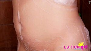 Blonde model relaxes in the shower during casting interview