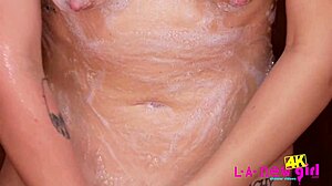 Blonde model relaxes in the shower during casting interview