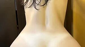 A college girl in a steamy shower lap dance scene