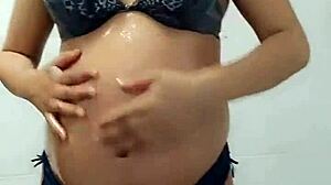 Bluee masturbates pregnant and flashes her cute ass