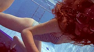 Sexy petite 18+ Russian teen Libuse shows small tits by pool