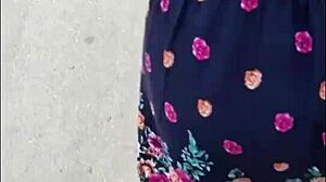 Following a fat Latina mommy bent over in the street, exposing her big ass