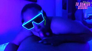 Submissive stepdaughter performs deepthroat blowjob with choking and gagging in neon room