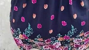 Following a fat Latina mommy bent over in the street, exposing her big ass