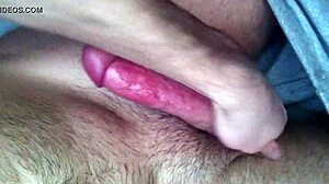 Masturbating hard with a big cock and cumming all over in intense solo action.