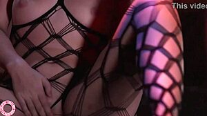 Sexy Samantha Rone teases in fishnet body stocking solo.
