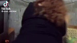 The mature prostitute with a big ass shows off her marked panties while teasing her clients