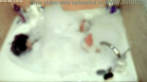 Boy enjoys solo bubble bath in bathroom