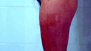 COLLEGE TANNED GORGEOUS GIRL TAKE A SHOWER IN BIKINI