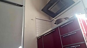 Hot woman cooking in the kitchen