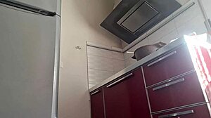 Hot woman cooking in the kitchen