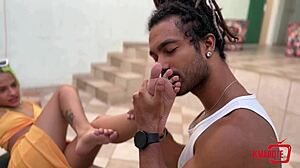 Brunette uses feet for suggestive handjob and gets covered