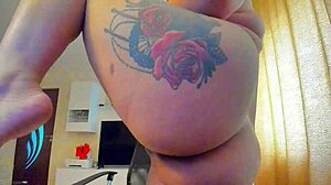 i have big natural tits and i'm playing with a dildo between them