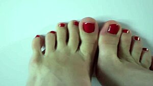 wow, close up footjob with cum dripping on feet!