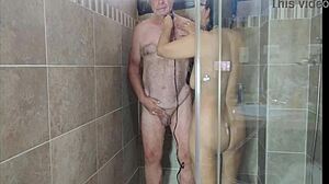 Hot sexy babe shaves in shower, giving jerk off instructions with big natural tits close up.