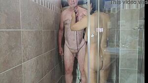 Hot sexy babe shaves in shower, giving jerk off instructions with big natural tits close up.