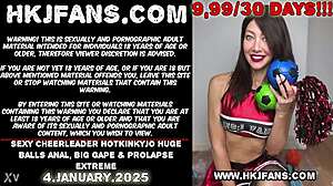 Sexy Cheerleader Hotkinkyjo Takes Huge Balls for Extreme Anal Gape