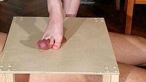 Wow, check this domina stomping cock with bare feet in HD footjob action!
