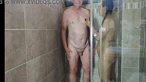 Hot sexy babe shaves in shower, giving jerk off instructions with big natural tits close up.