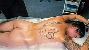 Male masseur gives tattoo girl a massage but she craves more