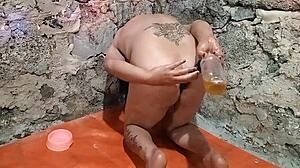 ts squirts piss and shoves toy lizards deep in anal play
