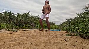 African Guy Jerks Off And Cums On The Beach!