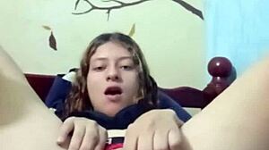 rich young beauty masturbates solo at home