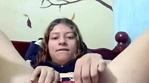 rich young beauty masturbates solo at home