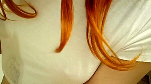 redhead teen 18+ relaxes in the bath with tattoos