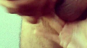 She plays with dick drool then gets cum bathed