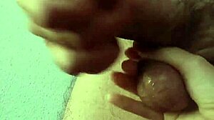 She plays with dick drool then gets cum bathed