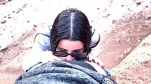 she reveals her face with glasses in deep blowjob in canyon