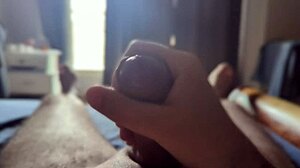 She's masturbating in the bedroom with sun rays shining through the window