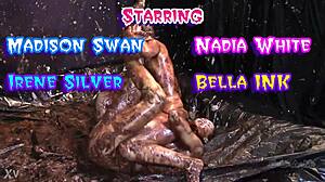 Glamorous nude mud wrestling with big tits