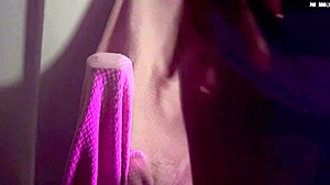 Gothic girl masturbates with controller in solo amateur scene