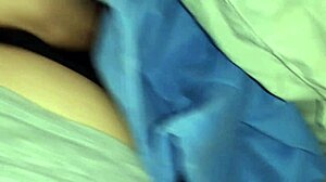 Three university students sneakily masturbate under blankets to stay hidden.