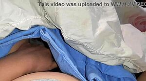 Three university students sneakily masturbate under blankets to stay hidden.