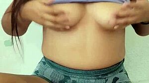 Cute student with big natural tits teases them after school