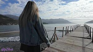 cute blonde milf walking outdoors with vibrator