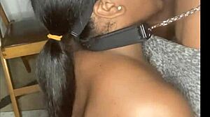thick ebony slut with huge natural tits in fishnets gets collared, leashed, and pounded hard in garage.