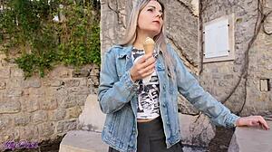 cute blonde milf walking outdoors with vibrator