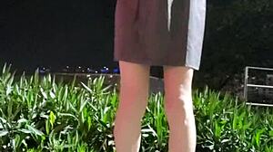 Shemale Ting Xuan pees and strokes outdoors now!