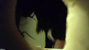 Hidden cam catches babe peeing in white panties through wall hole