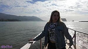 cute blonde milf walking outdoors with vibrator