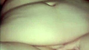 hannah, a beautiful girl, displays her big tits and boobs in this video