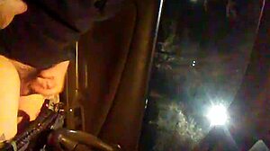 guy jerks off alone in car, enjoying outdoor privacy