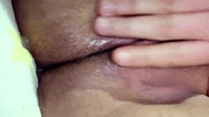 Young Girl Masturbates and Squirts Silently While Family Is In The Living Room